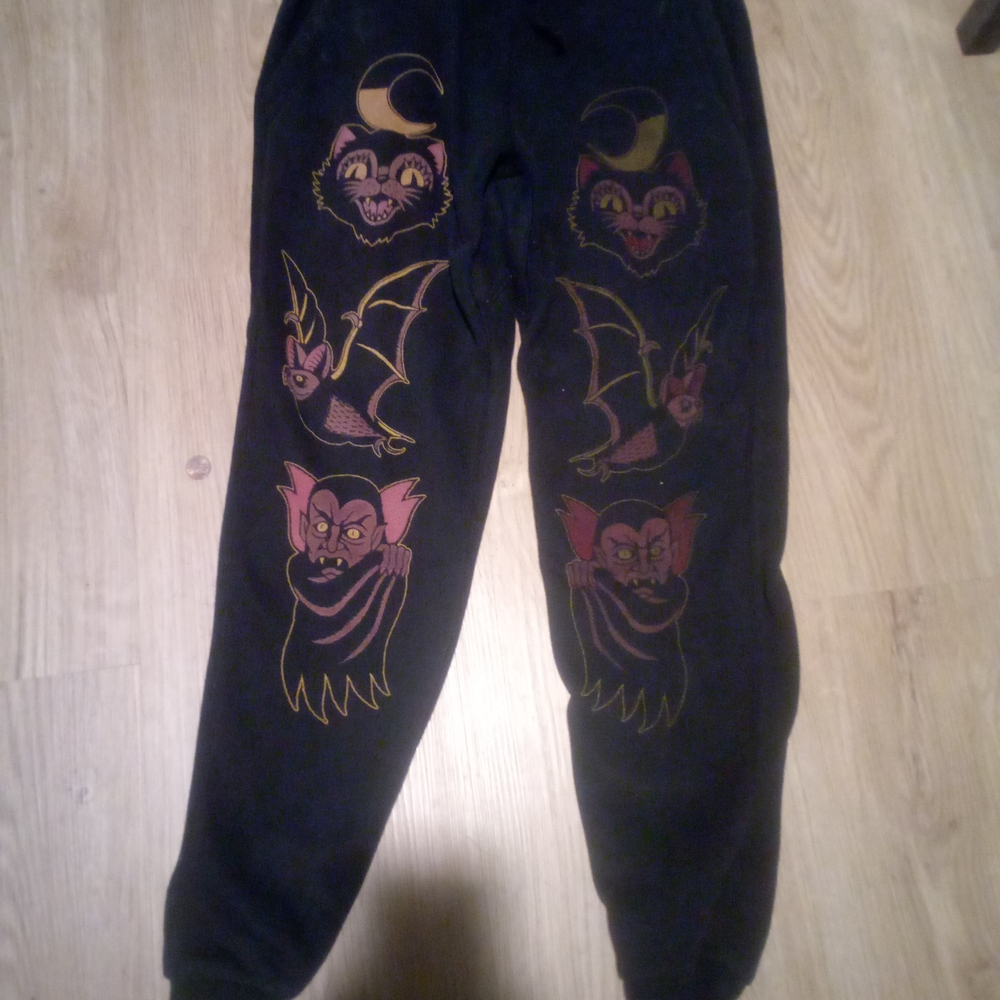 Blackcraft Cult Black Joggers with Colorful Bat Graphics